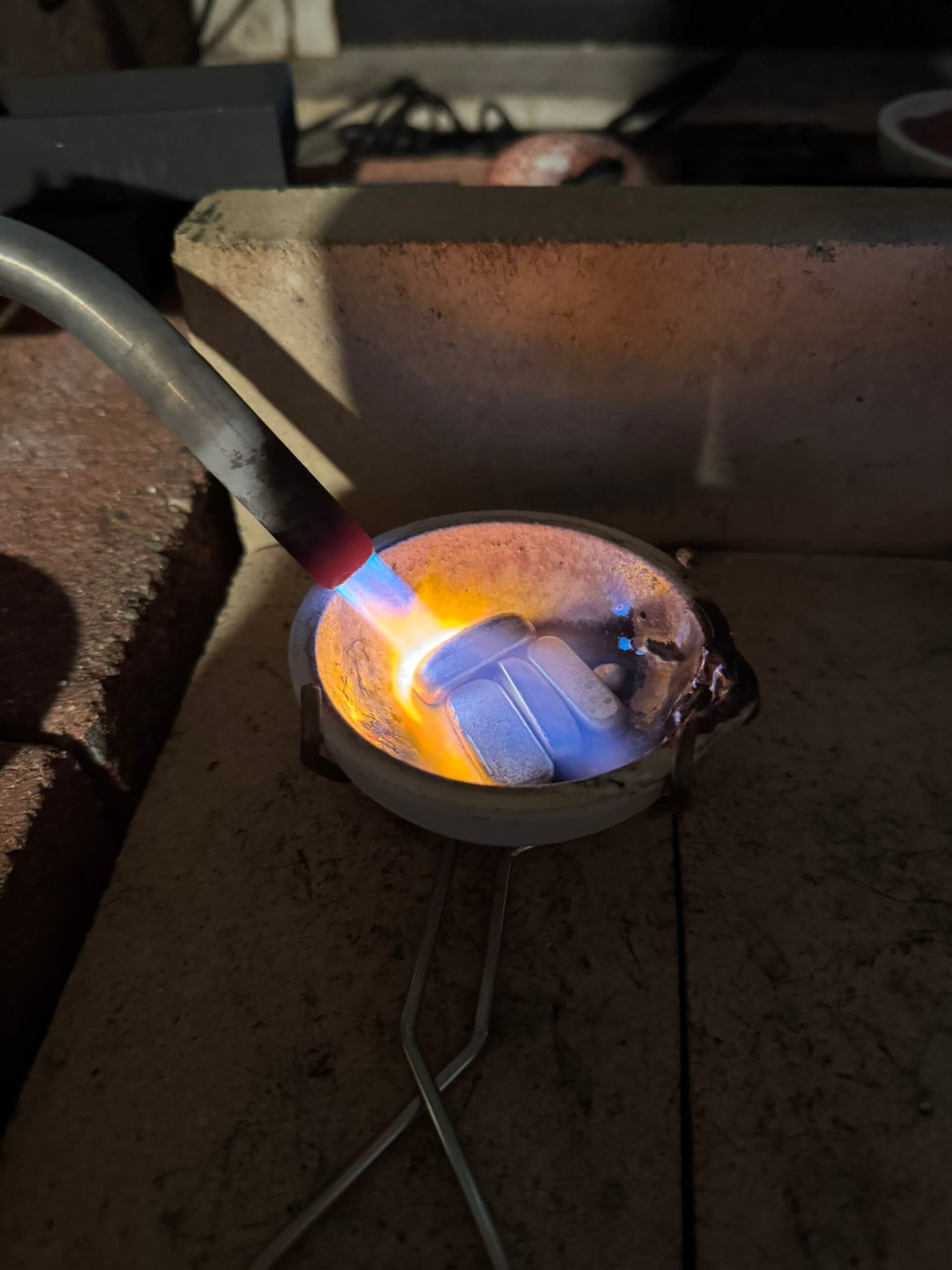 Jake Piskura Melting Ingots of Metal with a Torch
